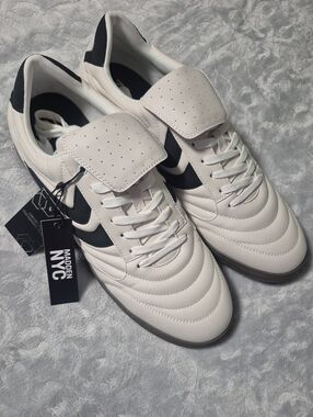 Madden NYC Men’s White Athletic Sneakers with Black Accents